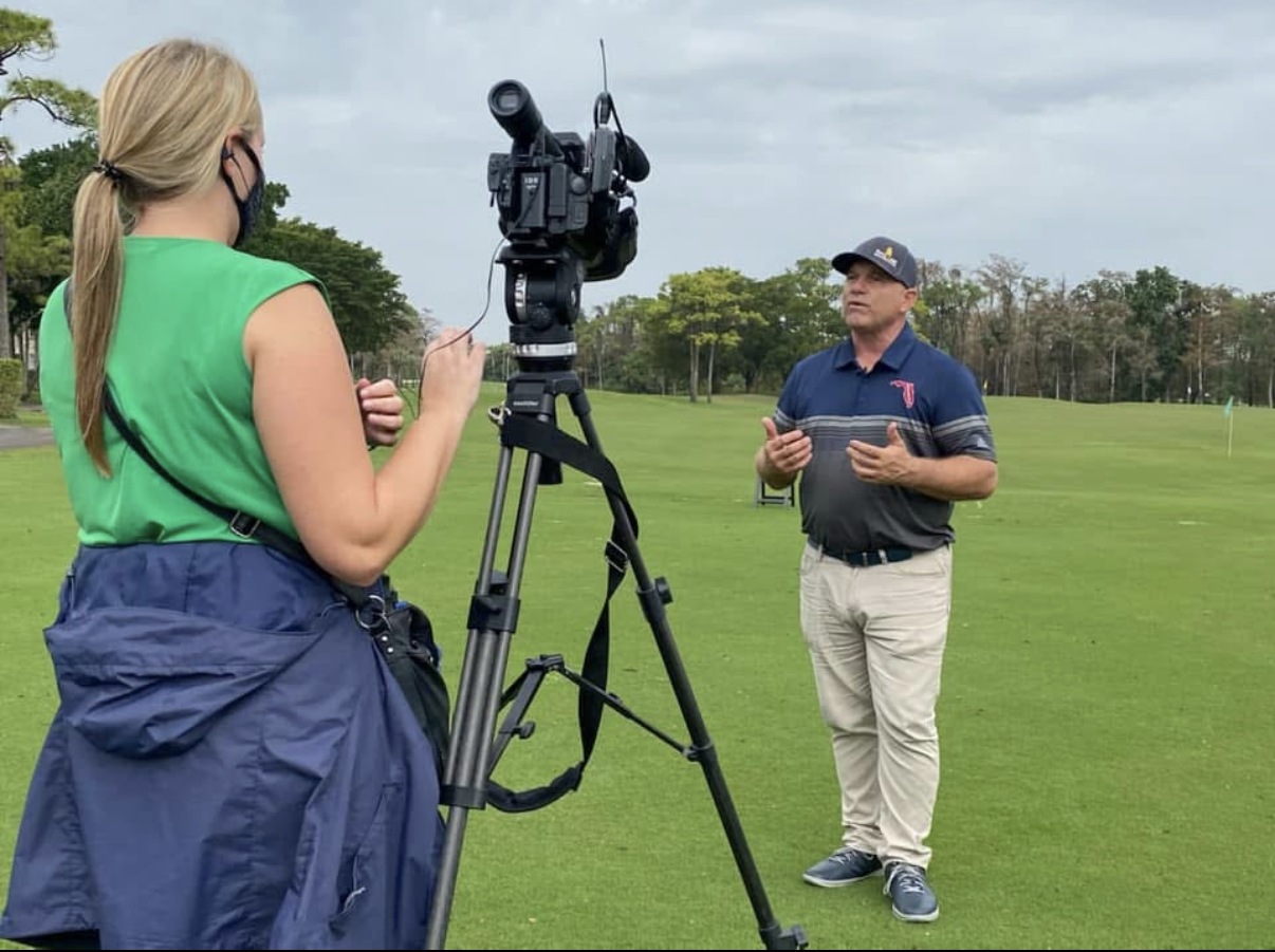 Billy Ashford being interviewed on the golf course