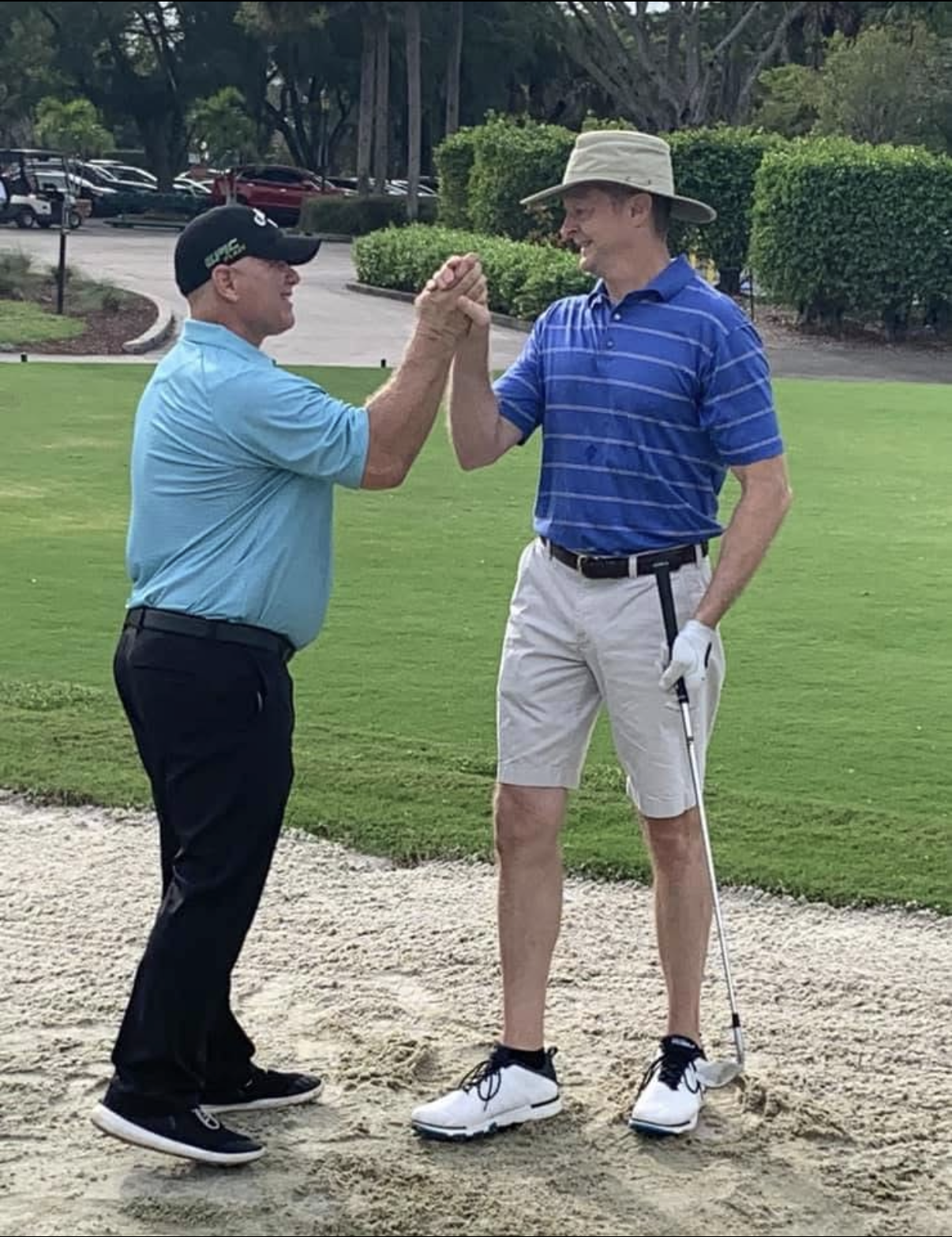 Billy Ashford celebrating with a student