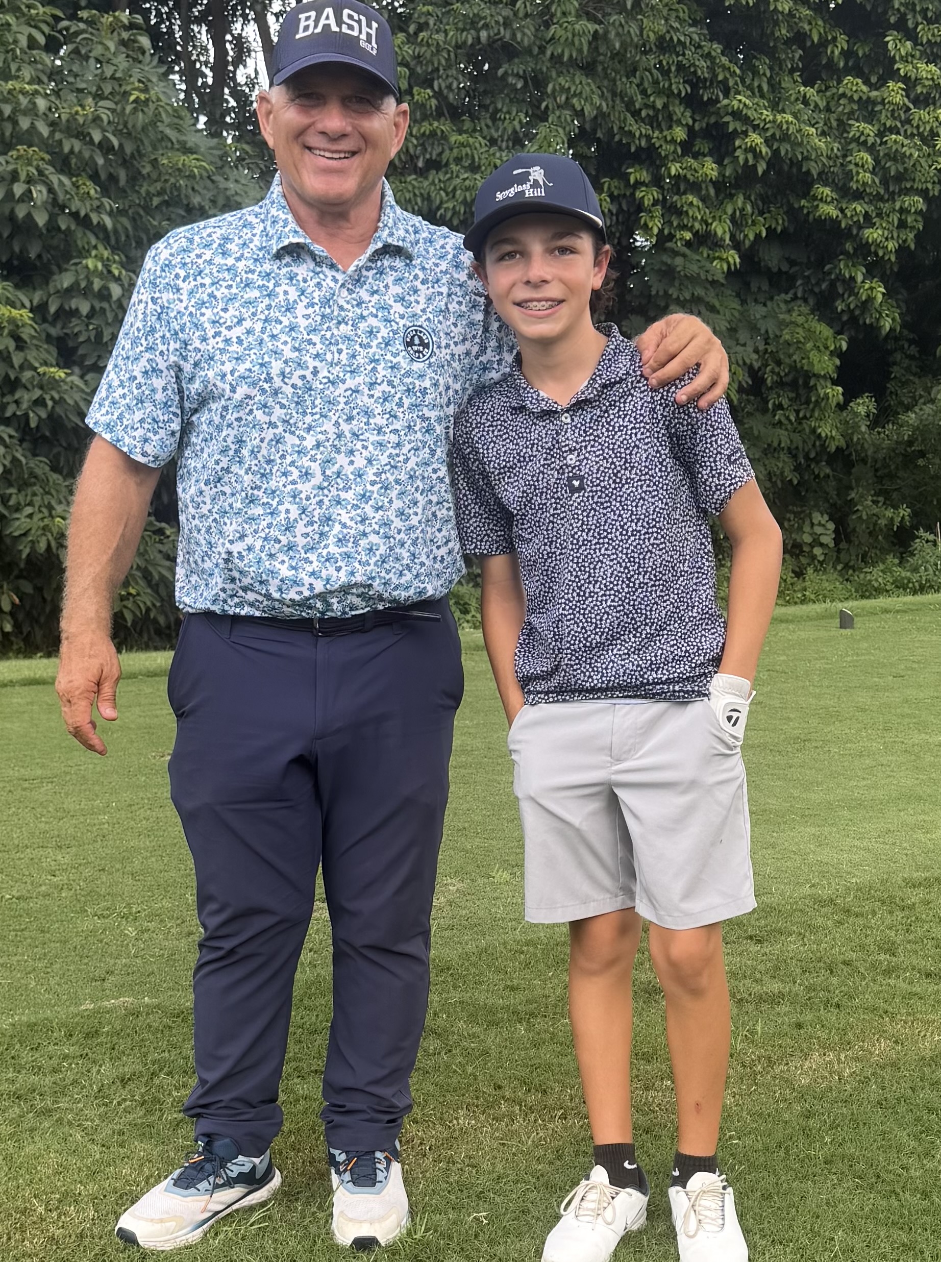 Billy Ashford with a junior golf student